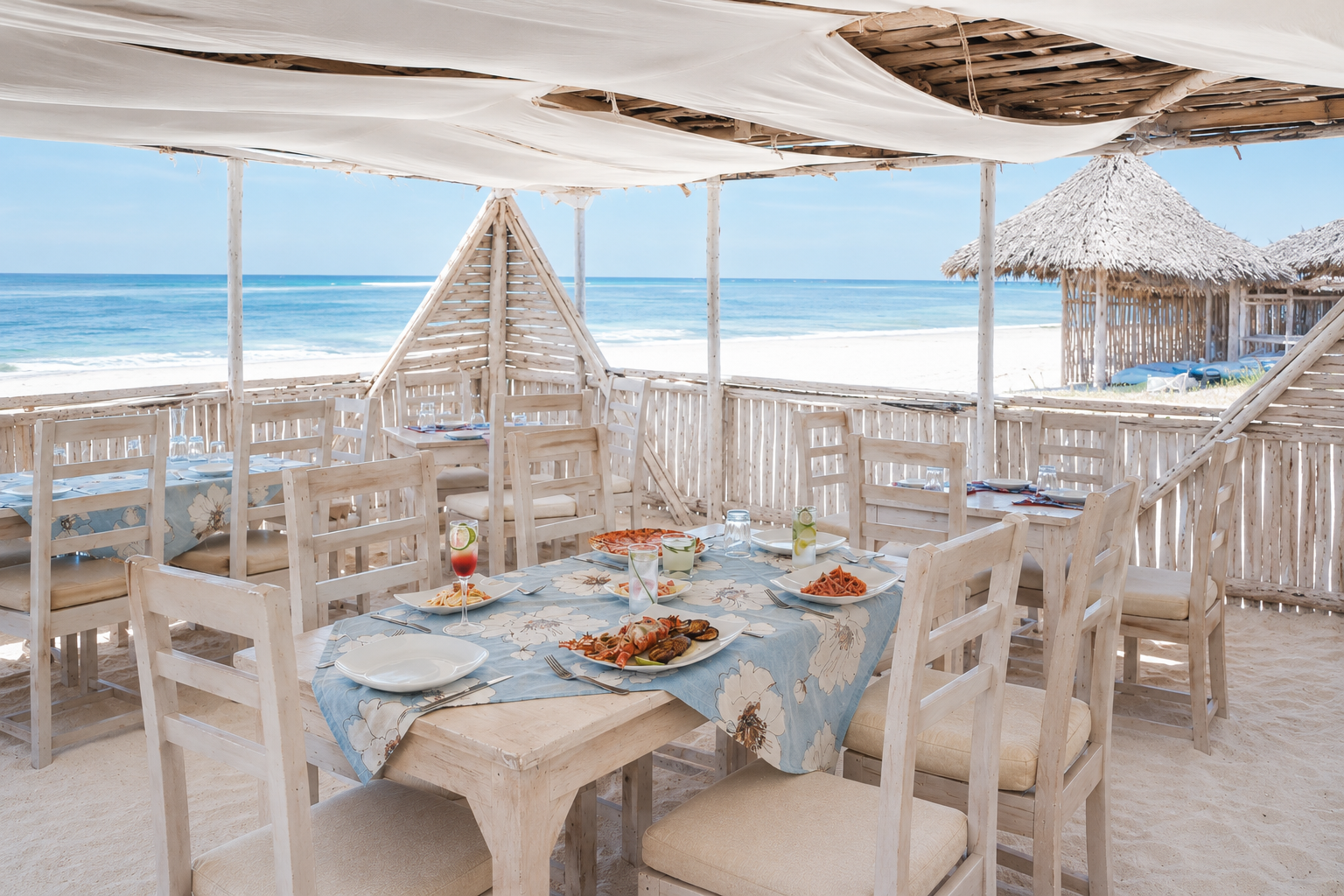 The beach restaurant at Exploreans Watamu — a thatched gazebo set on the sand of Mayungu Bay.